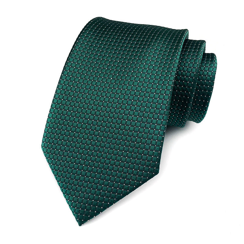 Klassisk 8 cm grønt slips med små firkanter og hvide prikker