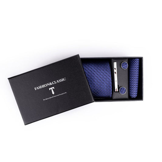 Stilfuldt slipsesæt i mønstret mørkeblå