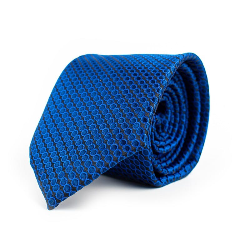 Stilfuldt slipsesæt i mønstret mørkeblå